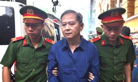 Cựu Phó Chủ tịch UBND TPHCM Nguyễn Hữu Tín tại TAND TPHCM. Ảnh: Tân Châu