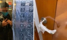 Chung cư Hà Nội thi nhau 'dùng chiêu' bọc nilon chống dịch corona