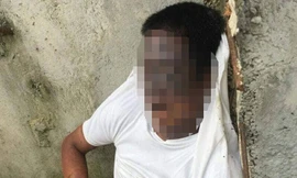 Người đàn ông gục chết tay cầm ống tiêm