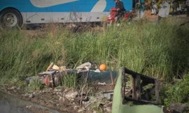 Phát hiện xác chết bên chiếc xe máy ở ven quốc lộ