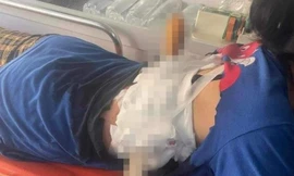 Chồng phóng dao xuyên lưng vợ