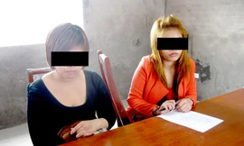 Hai đối tượng bán dâm tại cơ quan công an.