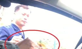 Lật tẩy nhiều bãi xe 'máy chém' tại Hà Nội