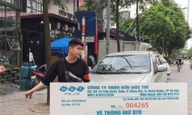 Xử phạt chủ bãi xe Linh Đàm là Công ty Hữu Trí Đức để nhân viên chặn đầu xe, đòi tiền sai quy định.