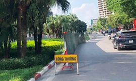 Yêu cầu các đơn vị thi công chỉ được xén dải phân cách vào ban đêm. Ảnh: A.Trọng