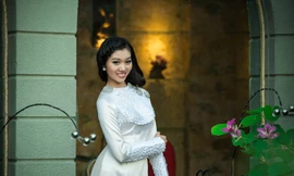 Thiếu nữ đẹp mơ màng với áo dài đầu đông