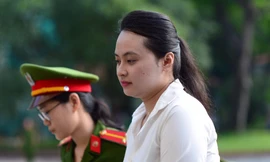 Hot girl Ngọc Miu tại tòa án sáng nay 23/7. Ảnh: Tân Châu