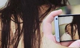 Xông vào nhà nghỉ quay clip người tình quan hệ với người đàn ông khác rồi tống tiền