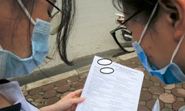 Con trai để lộ đề thi, hiệu trưởng bị kiểm điểm hạ bậc thi đua