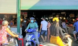 Bình Dương phát phiếu cho dân đi chợ 3 ngày một lần