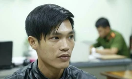 Quốc tại cơ quan công an. Ảnh: Công an cung cấp