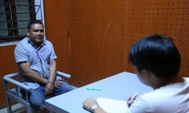 Công an lấy lời khai của Thanh (Ảnh: CACC)