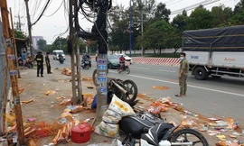 Xe tải ‘điên’ tông hàng loạt xe máy trên Quốc lộ 13 ở Bình Dương