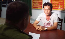 Lê Tuấn tú tại cơ quan điều tra.