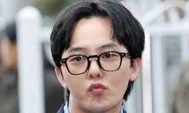 Cười khẩy và nhảy nhót ở đồn cảnh sát, G-Dragon bị chỉ trích ngạo mạn