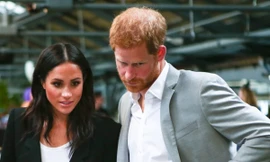 Biểu cảm chán nản của Harry khi ở cạnh Meghan gây chú ý