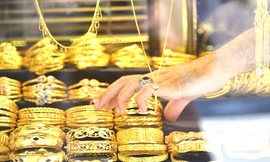 Giá vàng giảm mạnh, Phố Wall có 'biến' 