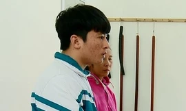 Nguyễn Văn Dương tại cơ quan công an.