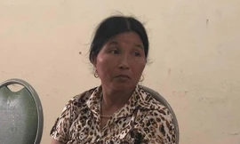 Bà Vân tại CQĐT. Ảnh BNA