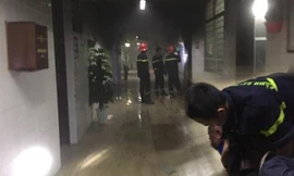 Hiện trường vụ cháy và nghi can khi bị khống chế