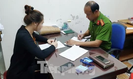 Trần Thị T. A. làm việc với CQĐT Công an thành phố Vinh.