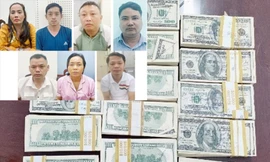 Khởi tố 7 đối tượng trong đường dây mua bán USD giả