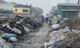 Cuộc sống khắc nghiệt tại ngôi làng bị gần 400 nghìn tấn rác thải bủa vây