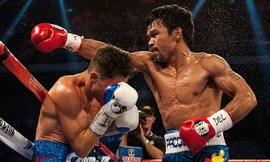 Pacquiao (phải) sẽ sử dụng găng tay của Reyes ở trận đấu với Maywhether