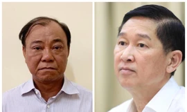 Bị can Lê Tấn Hùng (trái) và Trần Vĩnh Tuyến 