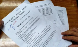 Đơn kêu cứu của gia đình anh Phạm Thanh QuangẢnh: Kim Sơn 