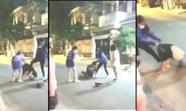 Hình ảnh hai học sinh trường THCS- THPT Phạm Ngũ Lão, quận Gò Vấp dùng mũ bảo hiểm đánh nữ sinh cùng trường diễn ra hồi tháng 10