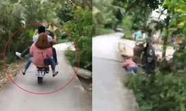 Nam thanh niên chở theo cô gái bốc đầu xe máy ngã xuống đường