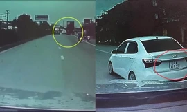 Tạt đầu xe máy ngã vào bánh xe container, 'xế hộp' nhanh chóng bỏ chạy