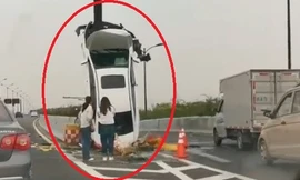 Nữ tài xế lái ôtô đâm vào dải phân cách khiến xe dựng đứng