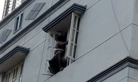 Giải cứu tên trộm bị mắc kẹt trên tầng 3