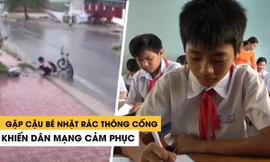 Gặp cậu bé nhặt rác thông miệng cống thoát nước khiến dân mạng cảm phục