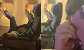 Choáng với dáng ngủ ‘bá đạo’ trên máy bay của nữ hành khách
