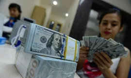 Ngân hàng Nhà nước tăng tỷ giá USD lên 22.957 đồng