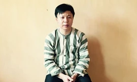 Đối tượng Trương Văn Long tại cơ quan công an. Ảnh: Xuân Ân