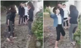 Hình ảnh 2 nữ sinh bị đánh xuất hiện trong clip gây xôn xao cộng đồng mạng - Ảnh cắt từ clip