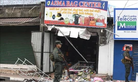 Binh sĩ gác tại hiện trường vụ đụng độ ở Minuwangoda, Sri Lanka, ngày 14/5/2019. Ảnh: AFP/TTXVN