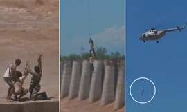 Thót tim cảnh Không quân Ấn Độ cứu hộ người mắc kẹt giữa sông. Ảnh chụp màn hình