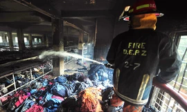 Cháy nhà máy may, ít nhất 112 người chết