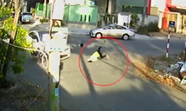 Phóng nhanh qua ngã tư, người phụ nữ lao vào ô tô rồi bay lên không trung