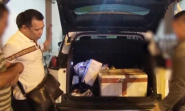 Hiện trường vụ bắt hai trùm ma túy vận chuyển 17 bánh heroin trên xe ô tô