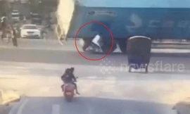 Nam thanh niên suýt bị container mất lái đè bẹp