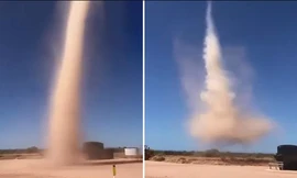 Lốc bụi cao hàng chục mét xuất hiện giữa đường