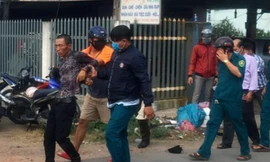 Người đàn ông cầm dao kề cổ cố thủ suốt 9 giờ