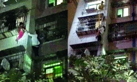 Em bé mắc kẹt ở cửa sổ tầng 5, cô Chen leo 5 tầng cứu bé
