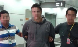 Nghi phạm Ardit Ferizi, 20 tuổi (giữa).